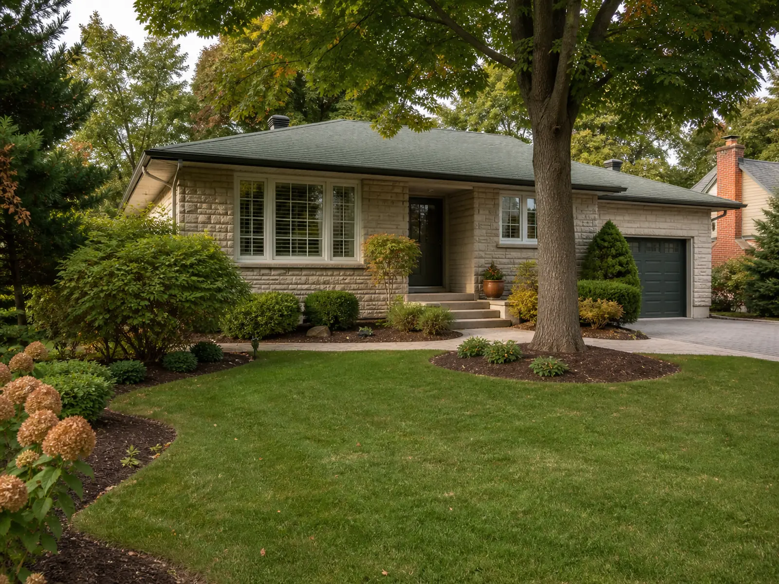 Well-stewarded Oakville property maintained through a four-season plan.